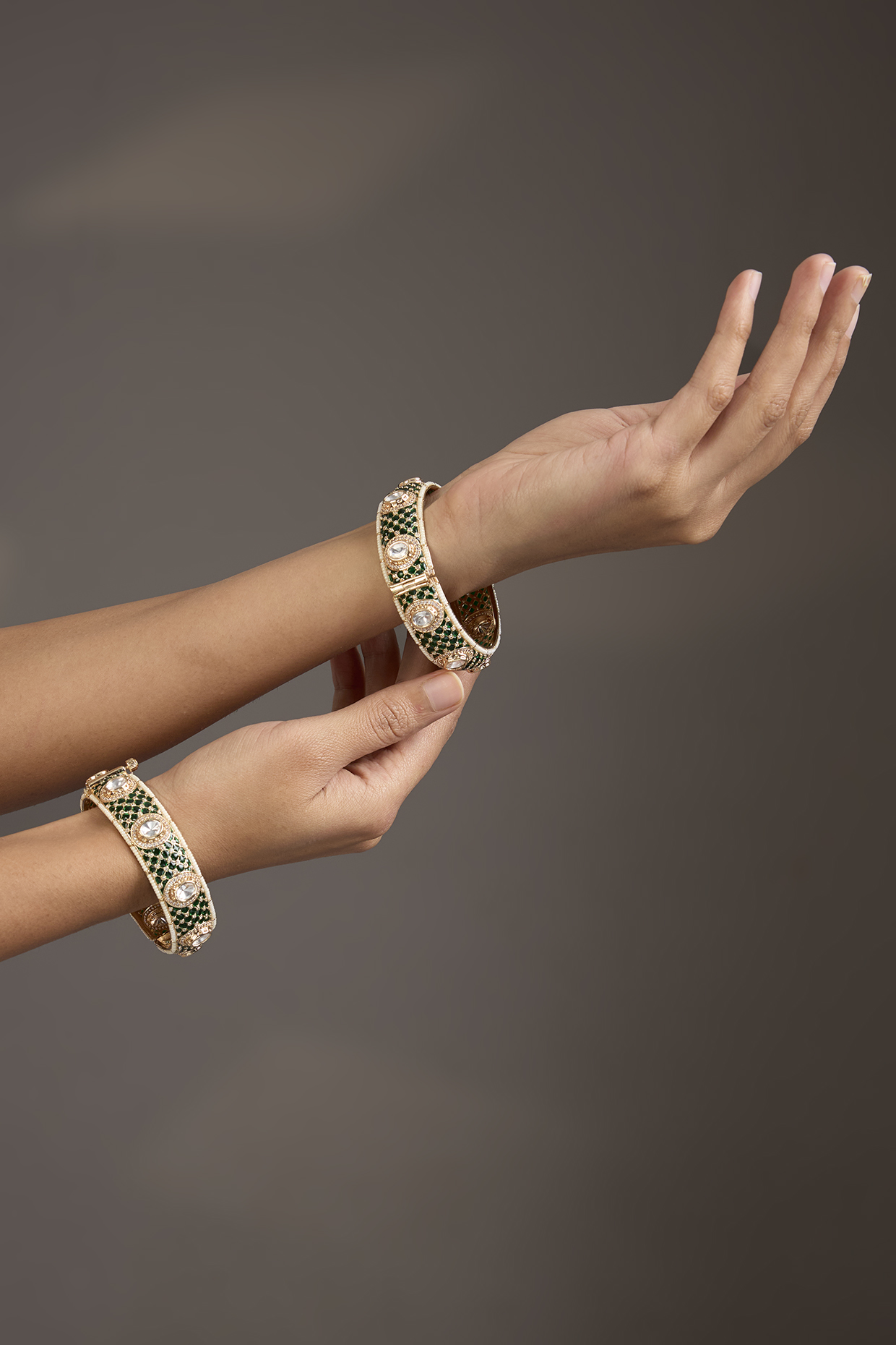 Gold Finish Emerald Green Kundan Polki Openable Meenakari Bangles (Set Of 2) by Aura Trends