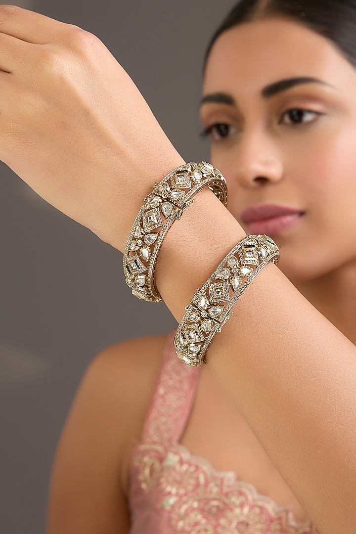Antique Gold Finish Kundan Polki Bangles (Set Of 2) by Aura Trends at Pernia's Pop Up Shop