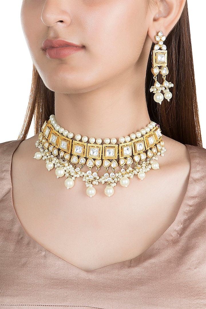 Gold Finish Kundan Necklace Set by Auraa Trends