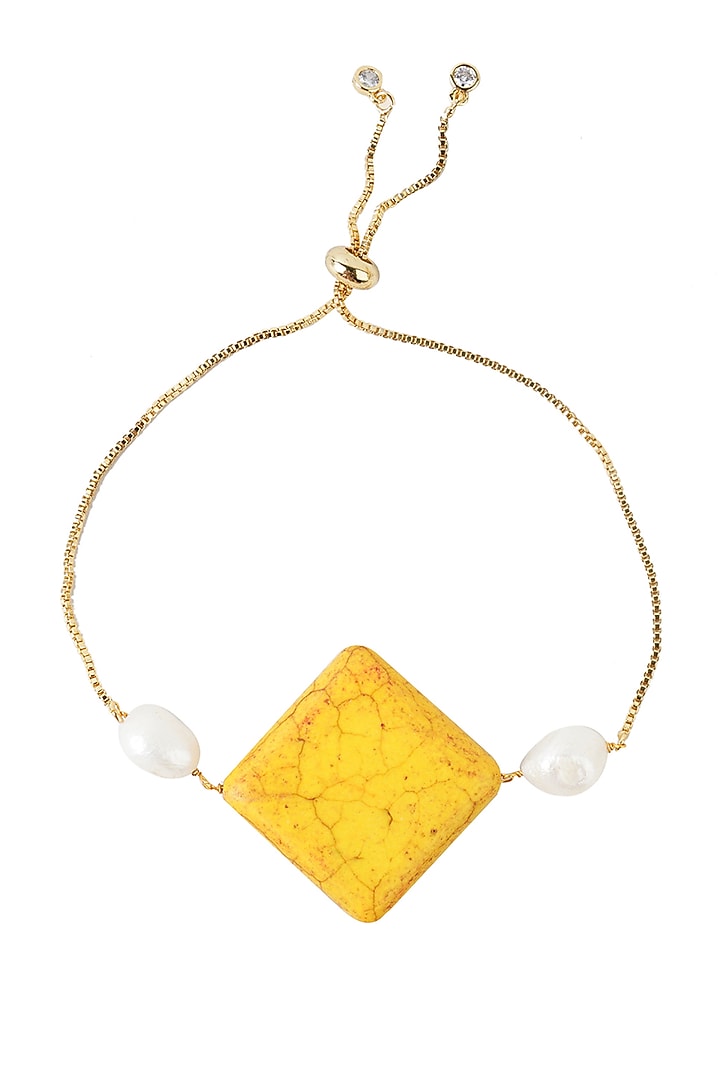 Gold Finish Bracelet Rakhi With Semi-Precious Onyx Stone by Aura Trends at Pernia's Pop Up Shop