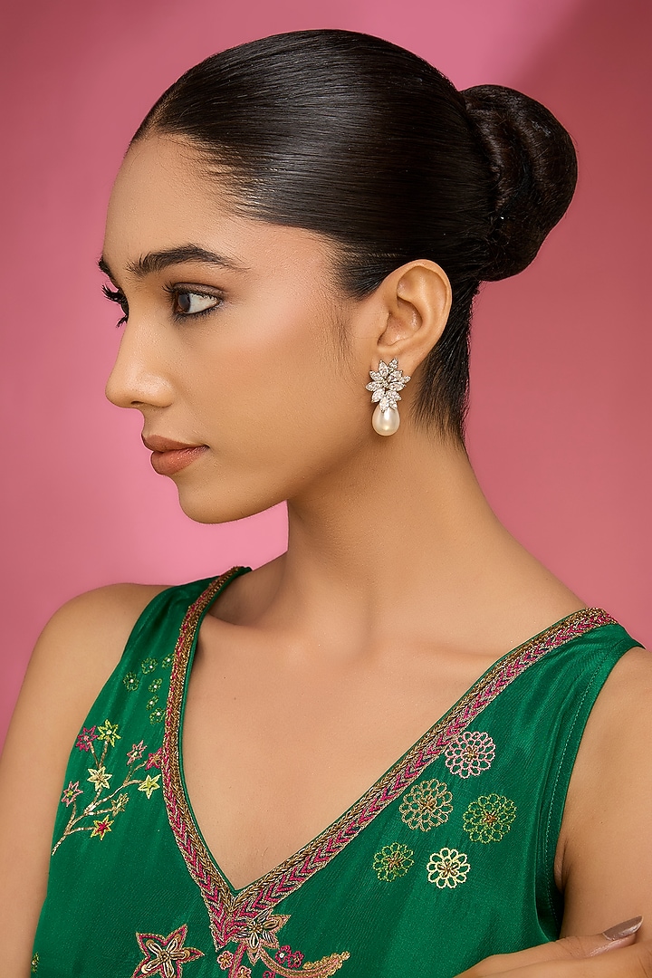 White Rhodium Finish Cubic Zirconia Floral Stud Earrings by Auraa Trends at Pernia's Pop Up Shop