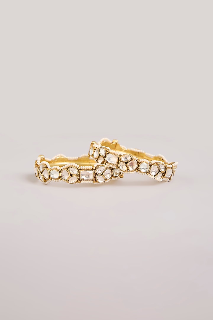 Gold Finish Kundan Polki Floral Bangles (Set Of 2) by Aura Trends at Pernia's Pop Up Shop