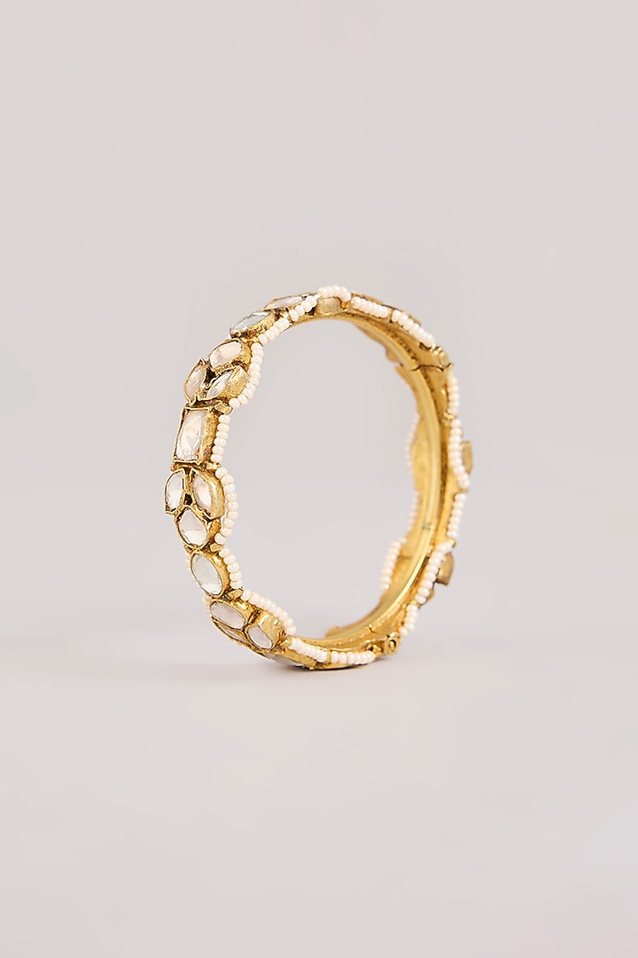 Gold Finish Kundan Polki Floral Bangles (Set Of 2) by Aura Trends at Pernia's Pop Up Shop
