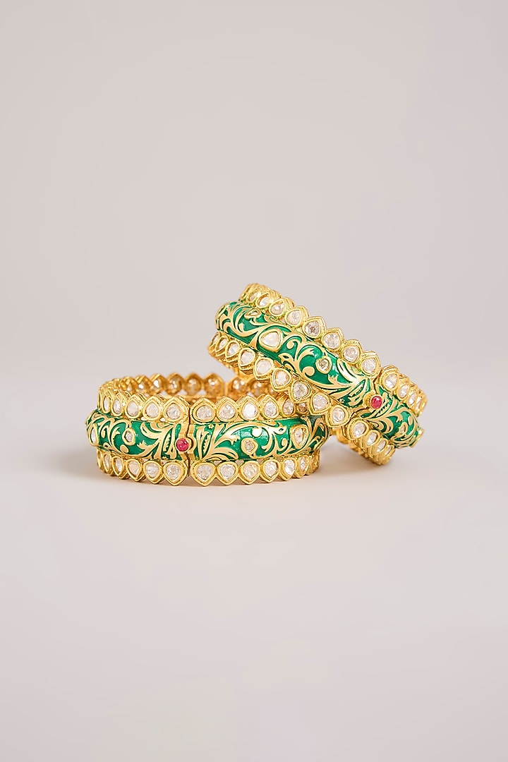 Gold Finish Red Stone & Pearl Beaded Green Meenakari Bangles (Set Of 2) by Aura Trends at Pernia's Pop Up Shop