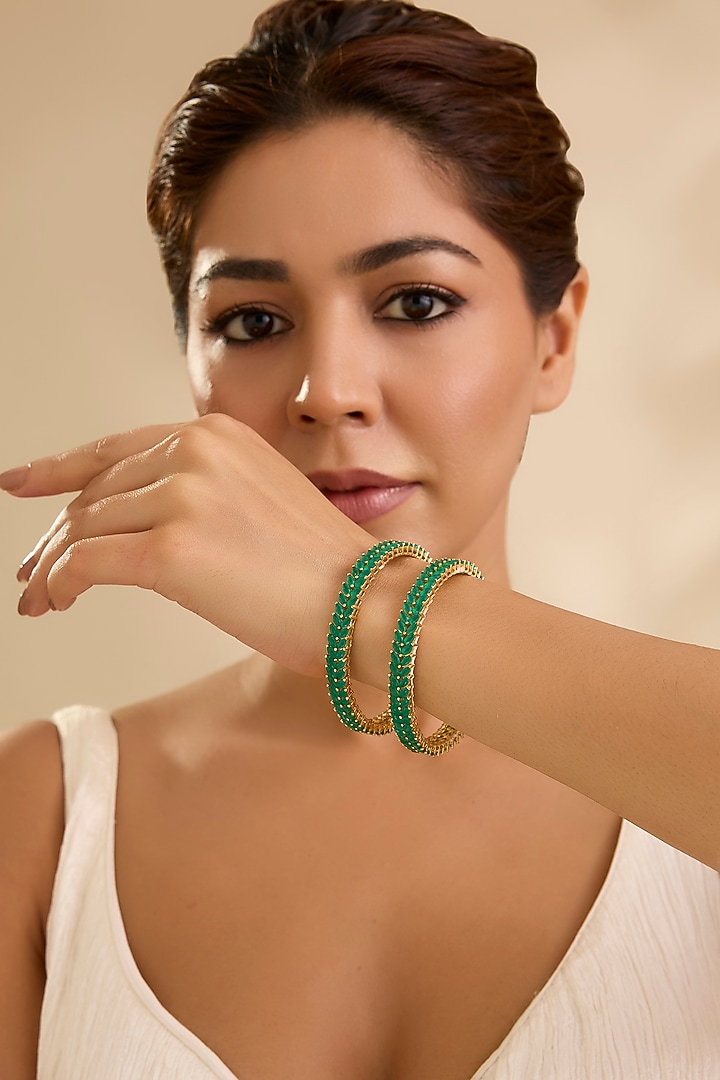 Gold Finish Green Stone Bangles (Set Of 2) by Aura Trends at Pernia's Pop Up Shop