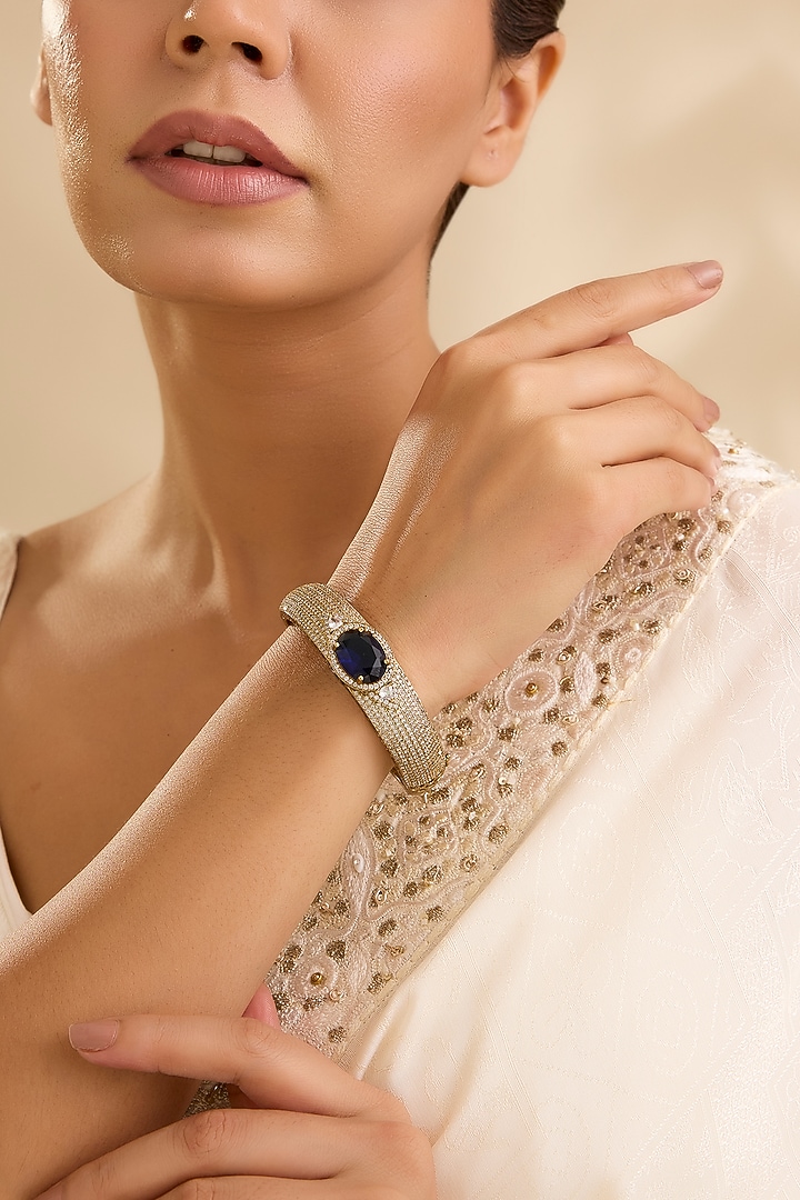 Gold Finish Kundan Polki & Blue Gemstone Cuff Bracelet by Aura Trends at Pernia's Pop Up Shop