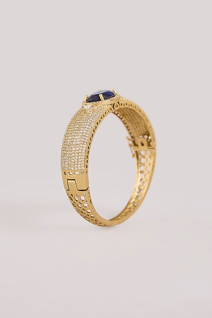 Gold Finish Kundan Polki & Blue Gemstone Cuff Bracelet by Aura Trends at Pernia's Pop Up Shop