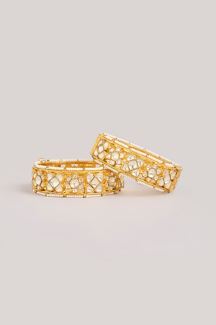 Gold Finish Kundan Polki Floral Motifs Bangles (Set Of 2) by Aura Trends at Pernia's Pop Up Shop