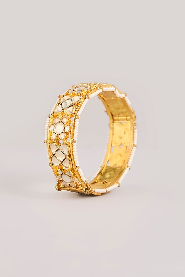 Gold Finish Kundan Polki Floral Motifs Bangles (Set Of 2) by Aura Trends at Pernia's Pop Up Shop