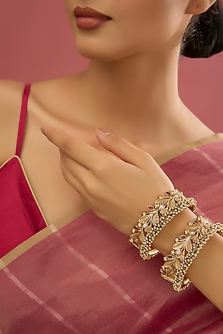 Gold Finish Pearl & Kundan Polki Bangles (Set of 2) by Aura Trends