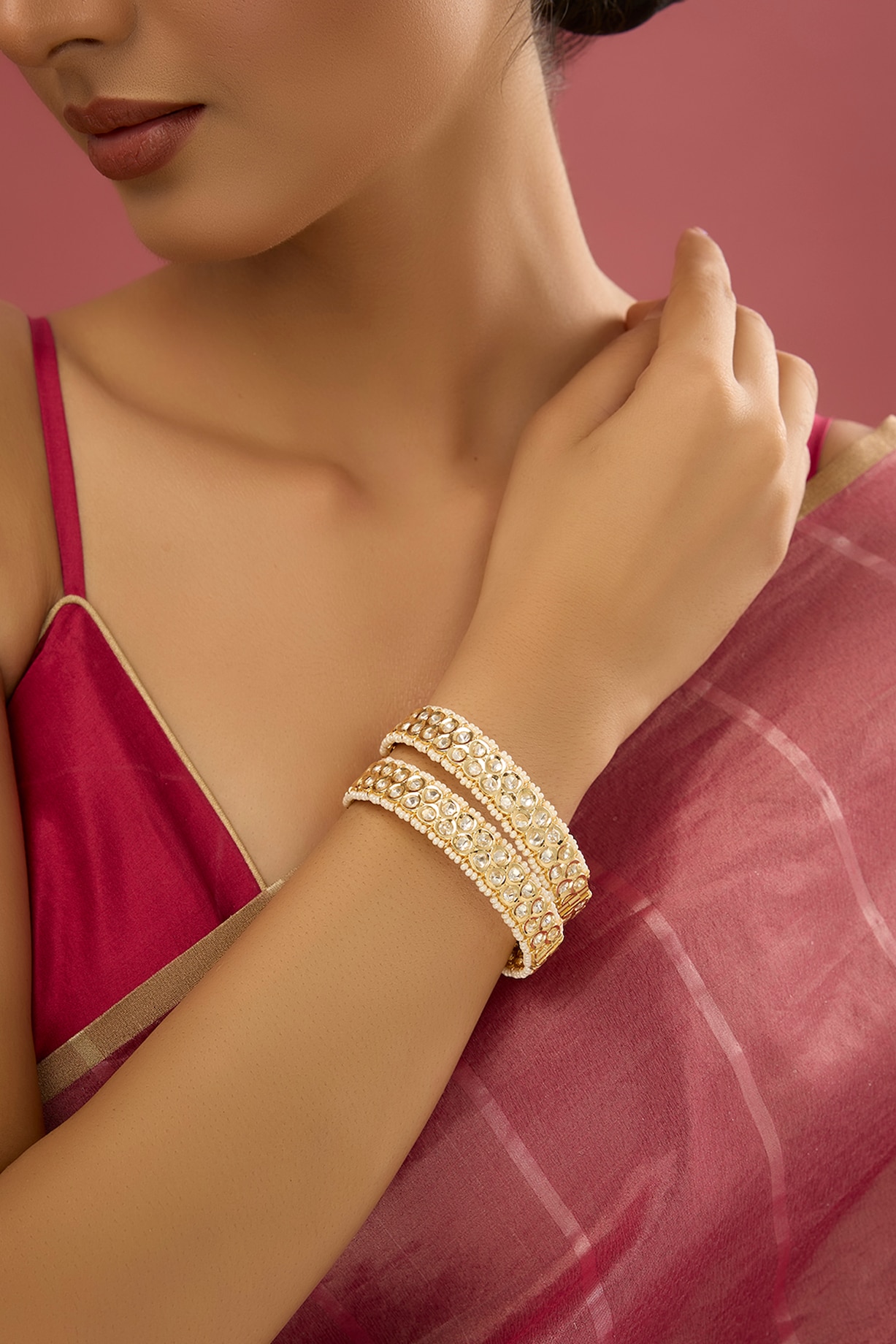 Gold Finish Zircon Kundan Polki Bangles (Set of 2) by Auraa