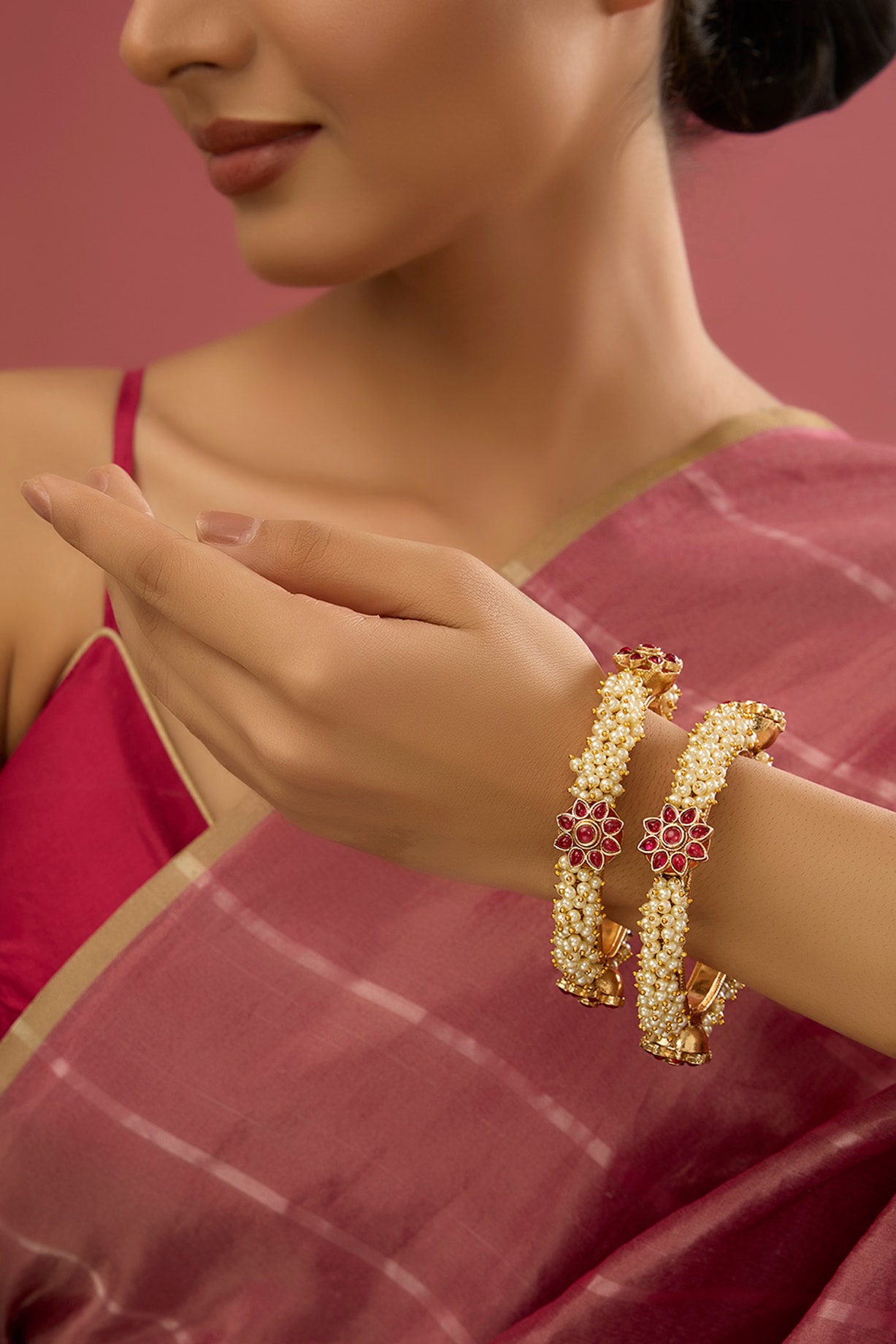 Rose Gold Finish Kundan Polki Pearl Bangles (Set Of 2) by Auraa