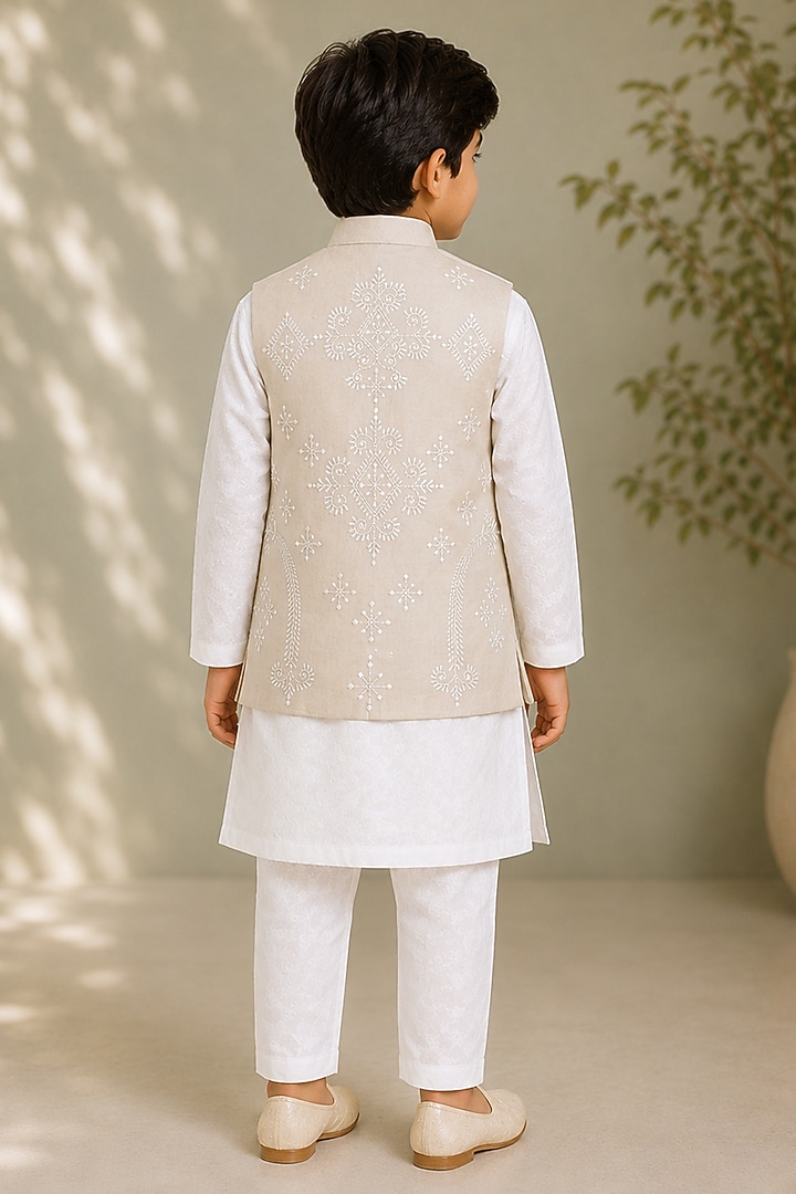 Beige Silk Embroidered Bundi Jacket For Boys by Arun Verma Kids at Pernia's Pop Up Shop