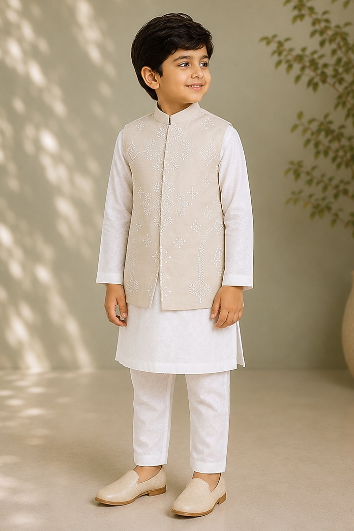 Beige Silk Embroidered Bundi Jacket For Boys by Arun Verma Kids at Pernia's Pop Up Shop