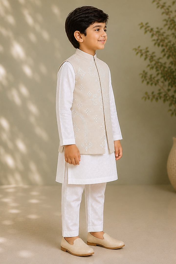 Beige Silk Embroidered Bundi Jacket For Boys by Arun Verma Kids at Pernia's Pop Up Shop