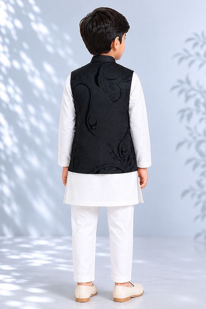 Black Silk Embroidered Bundi Jacket For Boys by Arun Verma Kids at Pernia's Pop Up Shop