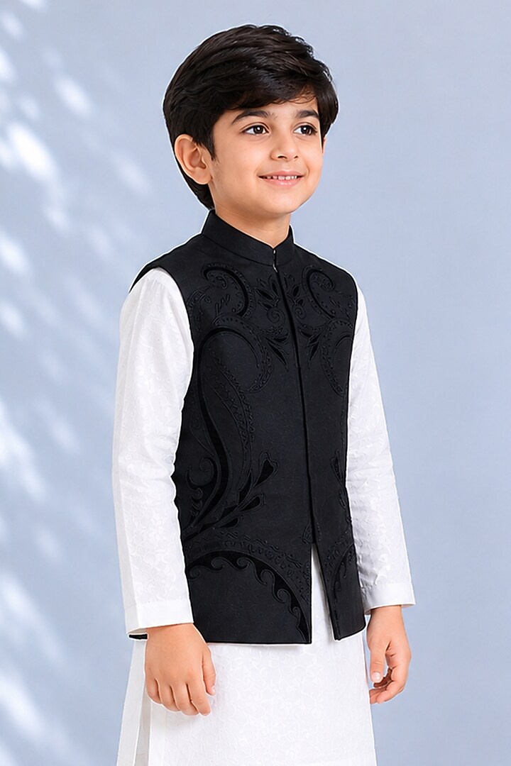 Black Silk Embroidered Bundi Jacket For Boys by Arun Verma Kids at Pernia's Pop Up Shop