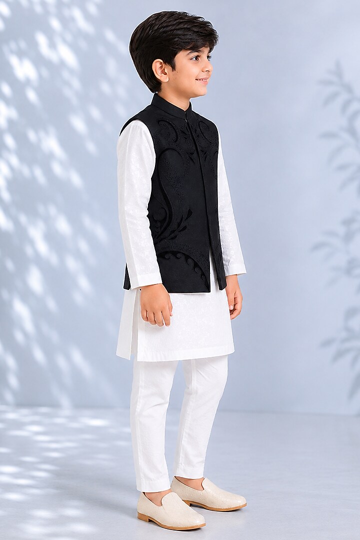 Black Silk Embroidered Bundi Jacket For Boys by Arun Verma Kids at Pernia's Pop Up Shop