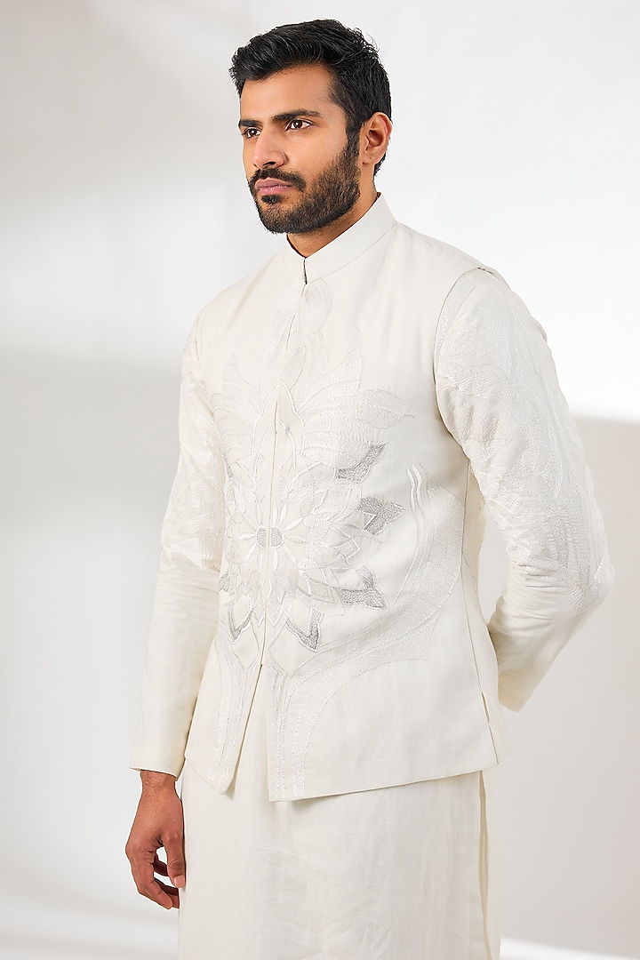 Ivory Silk Thread & Resham Embroidered Bundi Jacket by Arun Verma