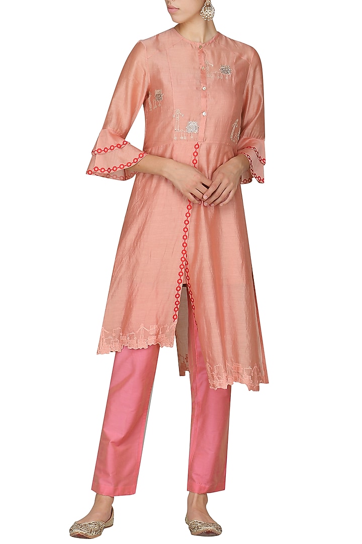 Pink laser cut embroidered tunic with pants available only at Pernia's Pop Up Shop.