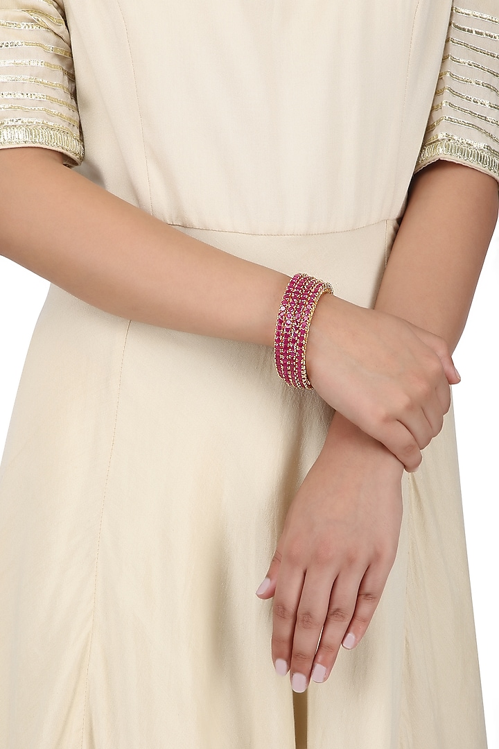 Set of 2 Gold Plated fuschia pink American Diamond bangles available only at Pernia's Pop Up Shop.