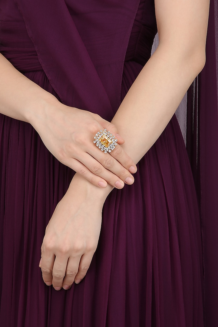 Gold Plated Ring In Alloy Studded with American Diamonds with A Copperish Color Stone by Auraa Trends