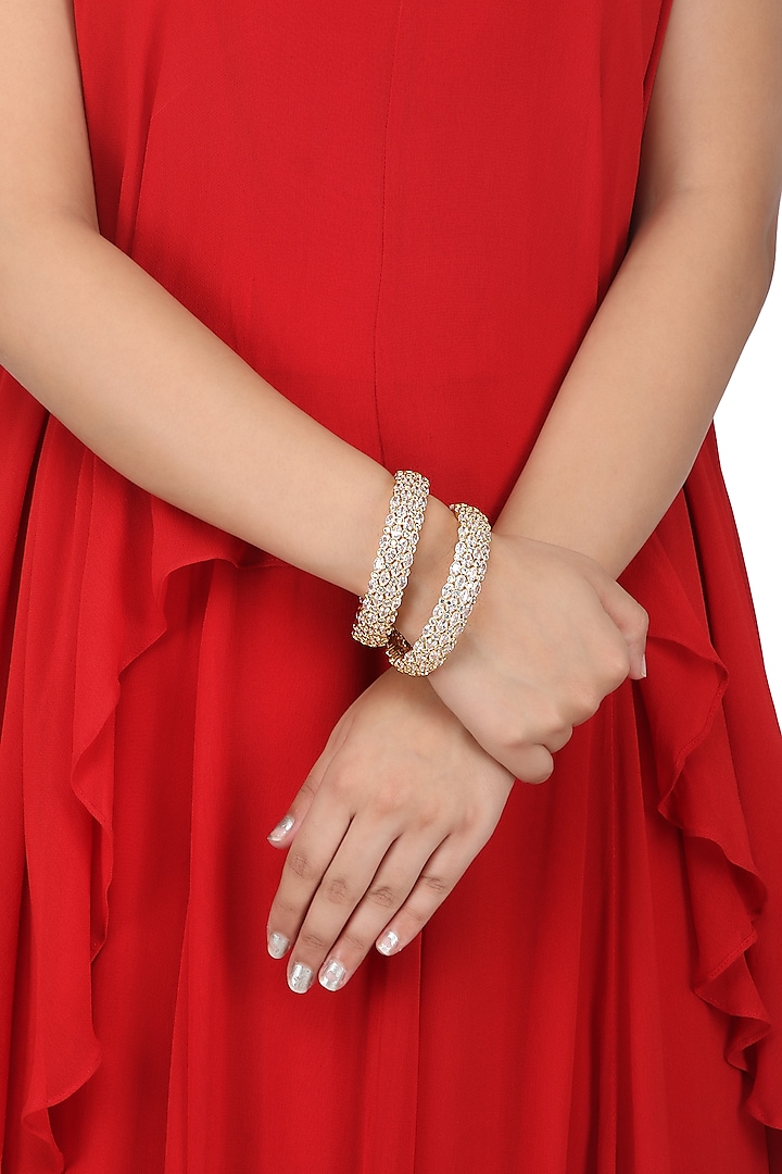 A Pair Of Gold Plated Round Bangle In Alloy Studded with Oval and Round American Diamonds by Auraa Trends