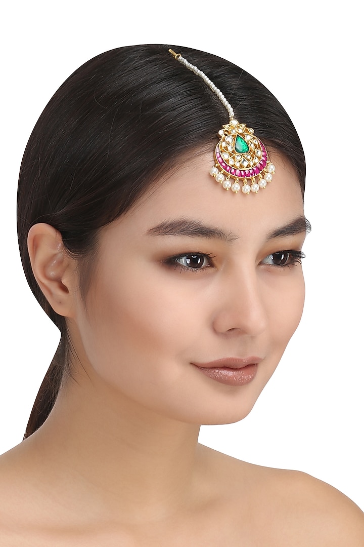Auraa Trends presents Gold finish kundan stone and pearl maang tikka available only at Pernia's Pop Up Shop.