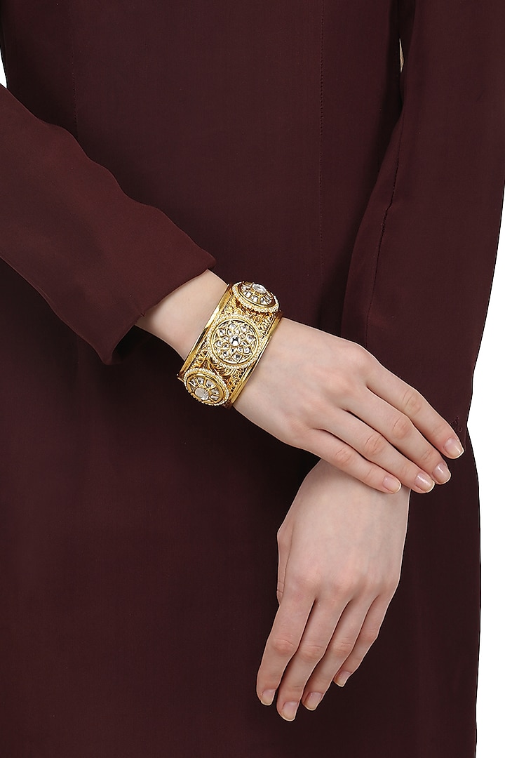 Gold Plated Kundan Pearl Multiple Motifs Bracelet by Auraa Trends