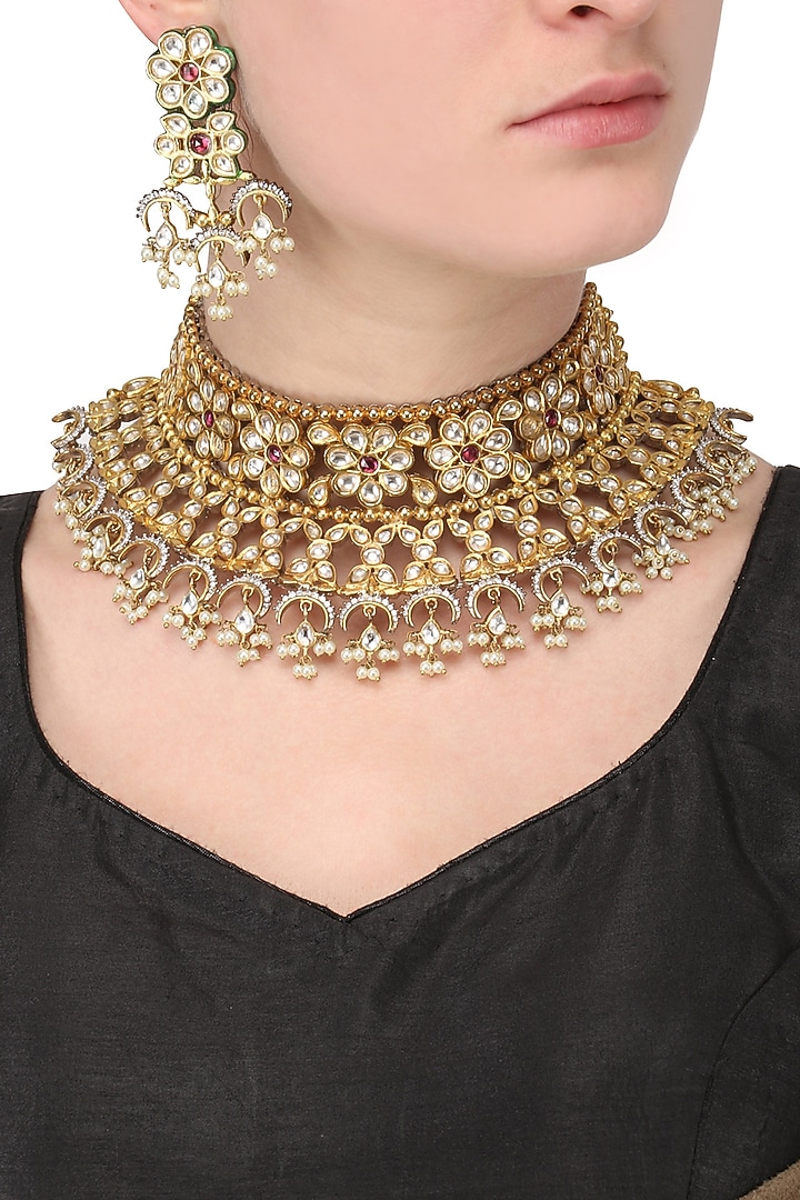 Gold finish kundan and red stone flower motif choker necklace set available only at Pernia's Pop Up Shop.
