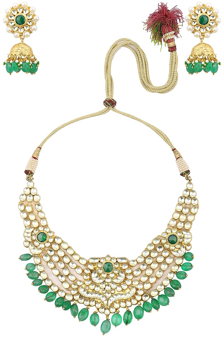 Gold finish kundan and green stone bridal necklace set available only at Pernia's Pop Up Shop.