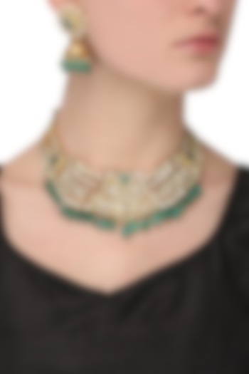 Gold finish kundan and green stone bridal necklace set  by Auraa Trends