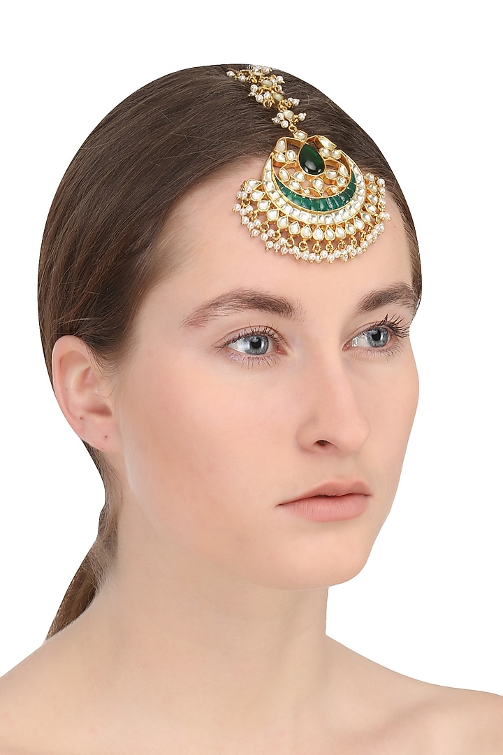 Gold finish kundan stone leaf motif maang tikka available only at Pernia's Pop Up Shop.