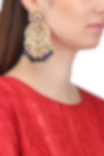 Gold finish kundan and blue semi precious stone earrings available only at Pernia's Pop Up Shop.