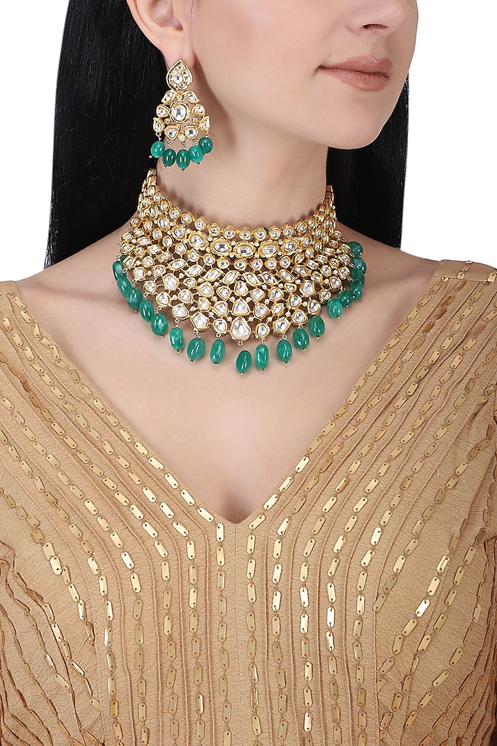 Gold plated kundan and green beads choker necklace set by AURAA TRENDS