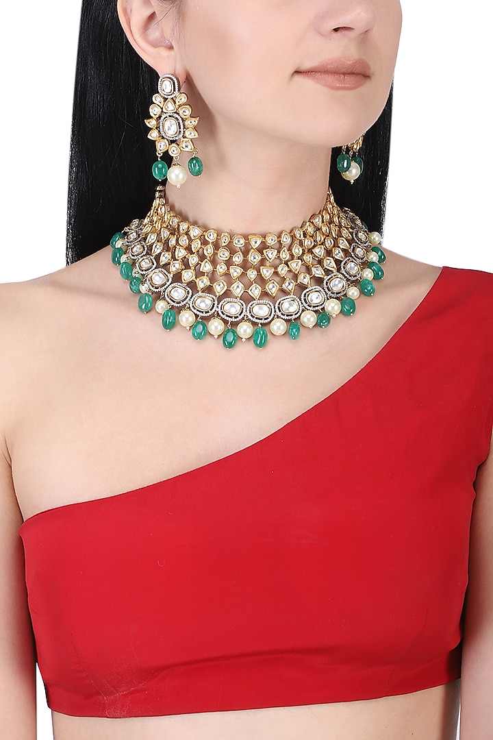 Gold plated kundan and white and green beads necklace set by AURAA TRENDS