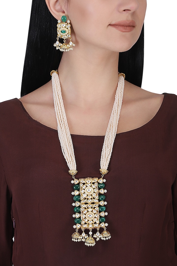 Gold plated kundan, green beads and pearl long necklace set by AURAA TRENDS