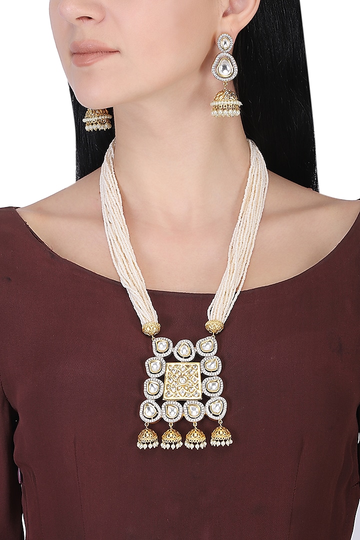 Gold plated white kundan and pearls long necklace set by AURAA TRENDS
