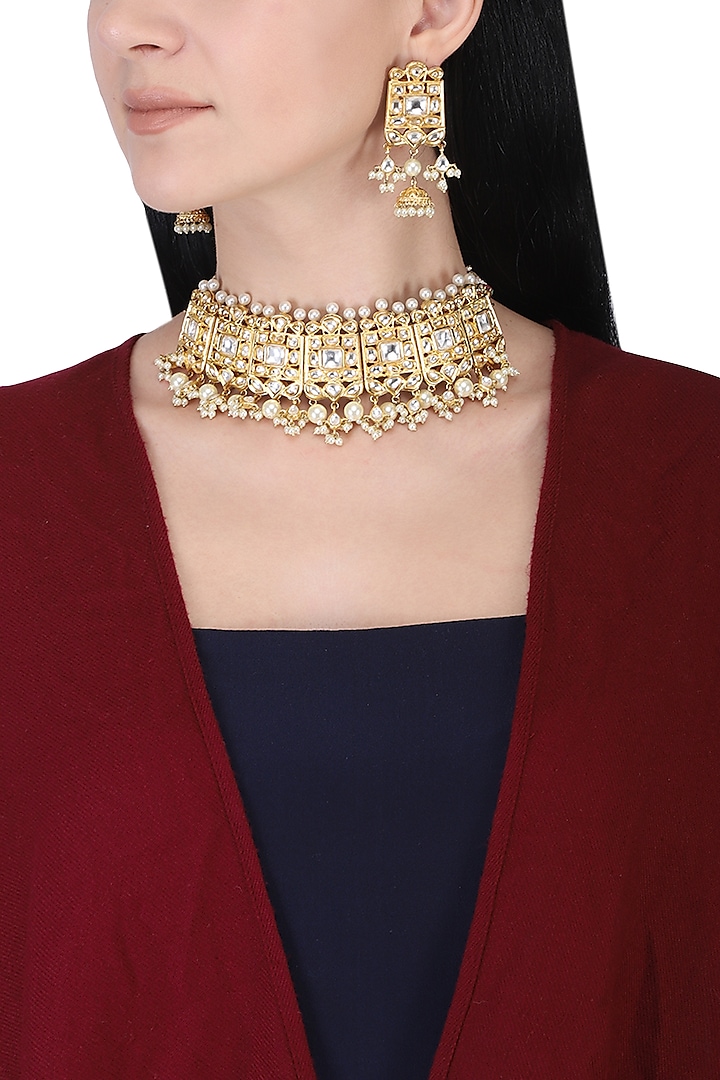 Gold plated kundan and pearl beads choker necklace set by AURAA TRENDS