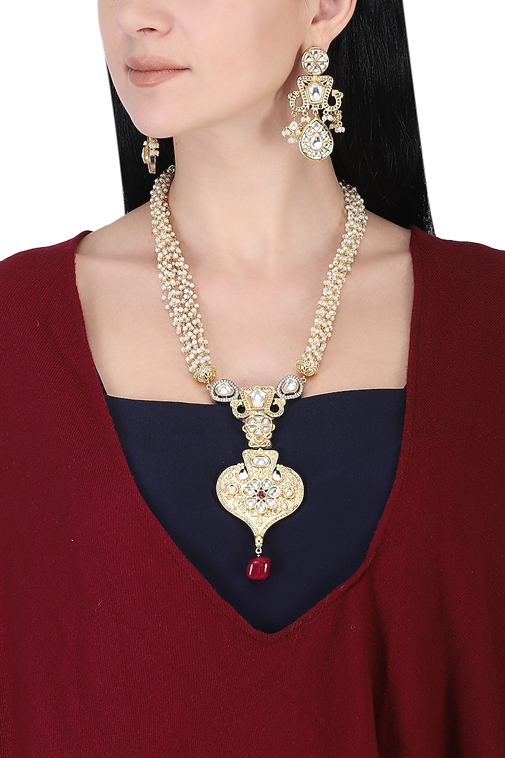 Gold plated kundan and red bead drop long necklace set by AURAA TRENDS