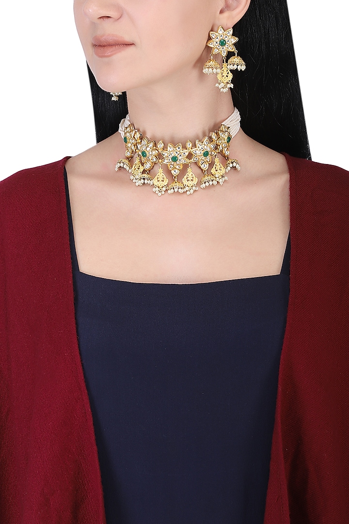 Gold plated kundan, green beads and pearl bunch choker necklace set by AURAA TRENDS