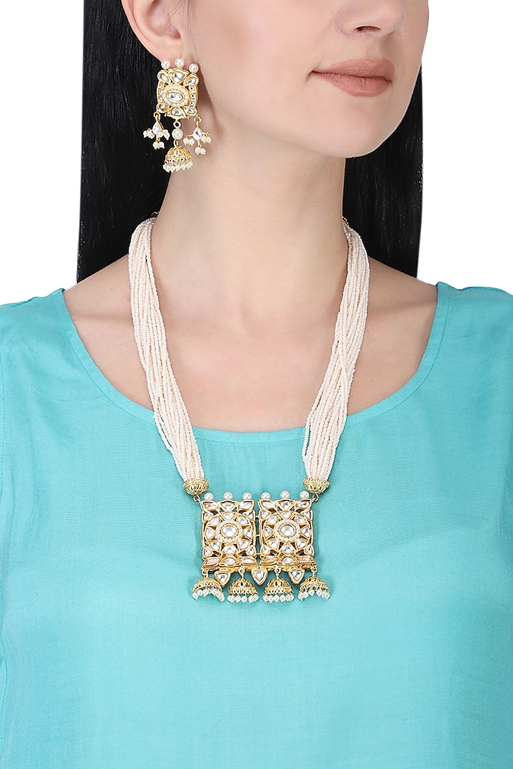Gold plated kundan and pearl long necklace set by AURAA TRENDS