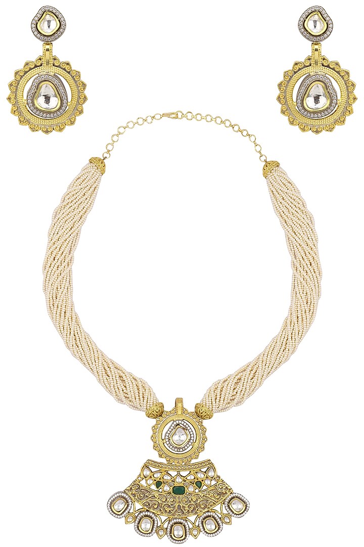 Antique gold finish kundan studded pendant set available only at Pernia's Pop Up Shop.