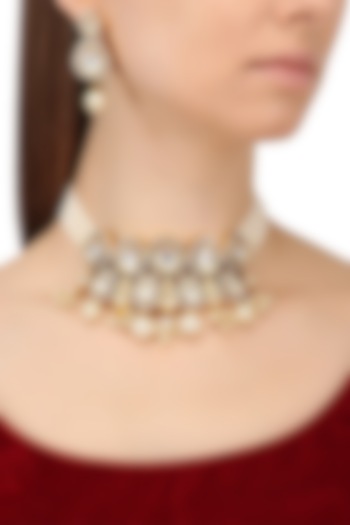 Gold finish kundan and pearl choker necklace set available only at Pernia's Pop Up Shop.