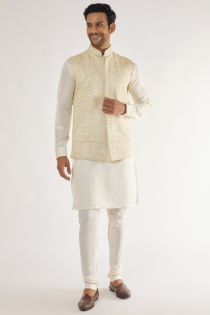 Cream Artificial Silk Embroidered Bundi Jacket Set by AVEGA