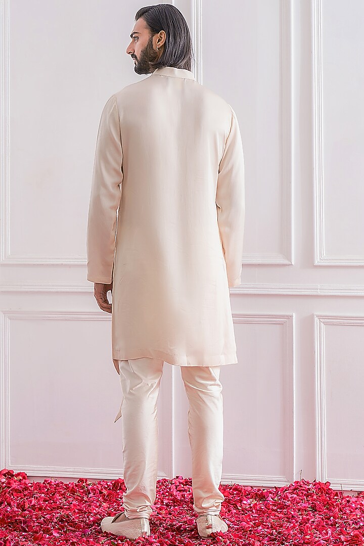 Champagne Asymmetrical Kurta Set With Nehru Jacket by Ankit V Kapoor at Pernia's Pop Up Shop
