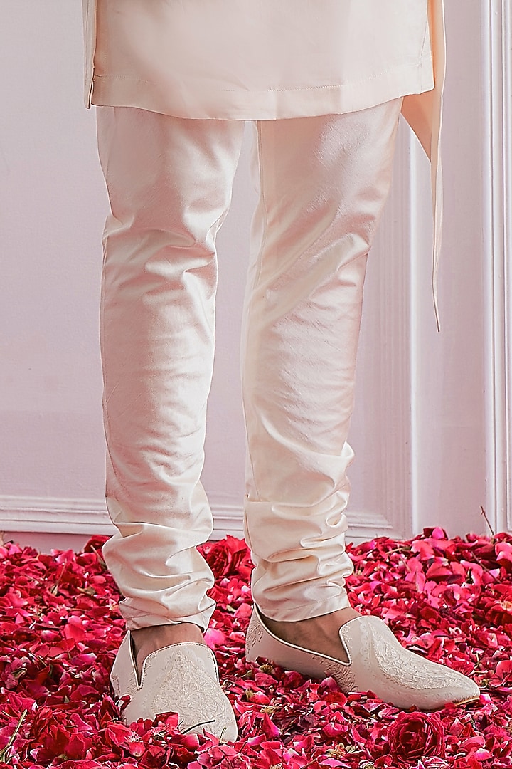 Champagne Asymmetrical Kurta Set With Nehru Jacket by Ankit V Kapoor at Pernia's Pop Up Shop