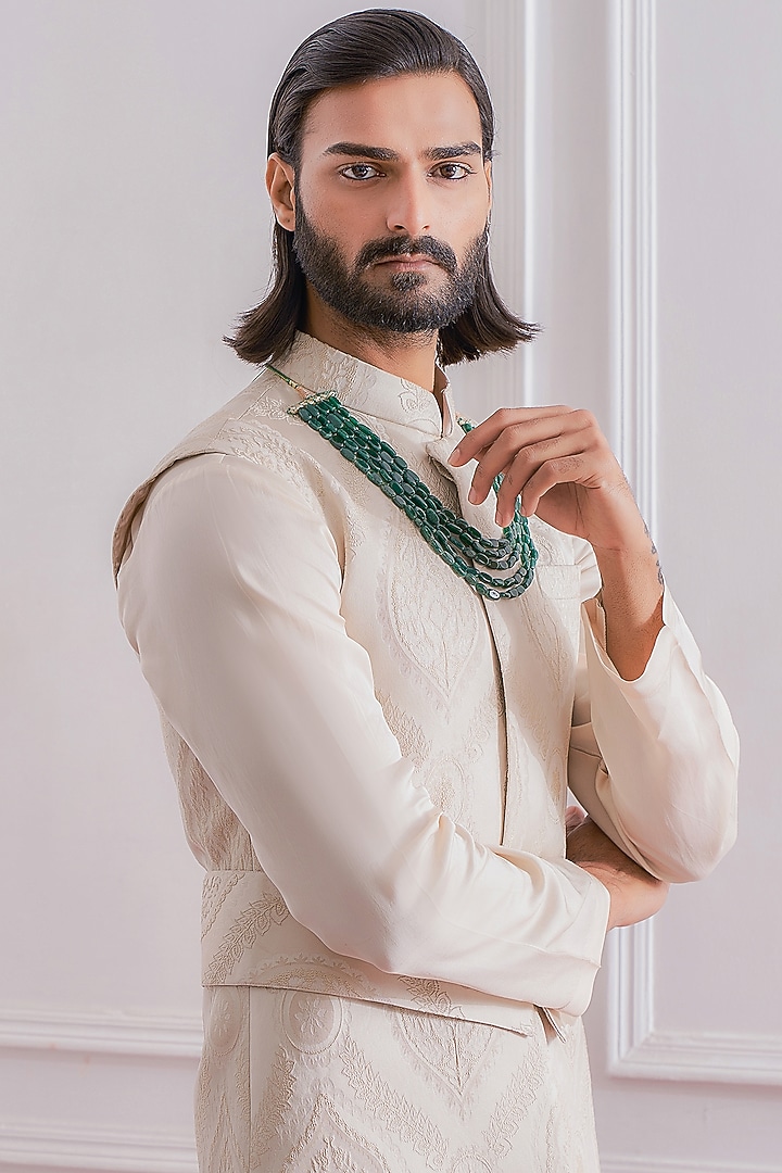 Champagne Asymmetrical Kurta Set With Nehru Jacket by Ankit V Kapoor at Pernia's Pop Up Shop