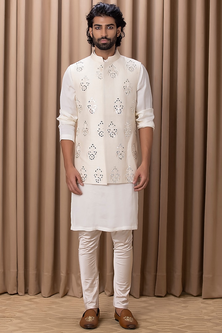 Beige Raw Silk Mirror Hand Embroidered Bundi Jacket by Ankit V Kapoor at Pernia's Pop Up Shop