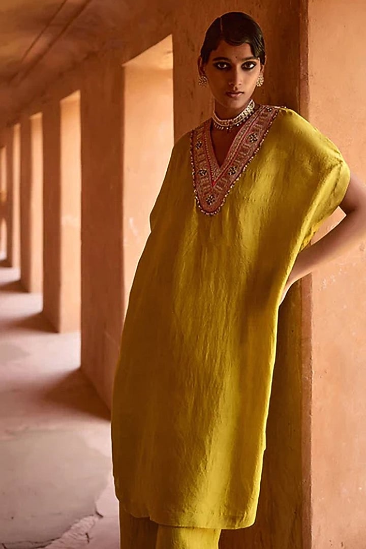 Yellow Mulberry Silk Metal Sequins Embroidered Kaftan Kurta Set by Avacara at Pernia's Pop Up Shop